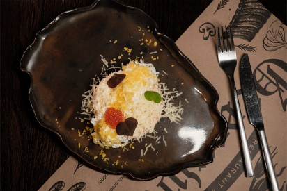 Salad with salted salmon, parmesan cheese and dried egg yolks